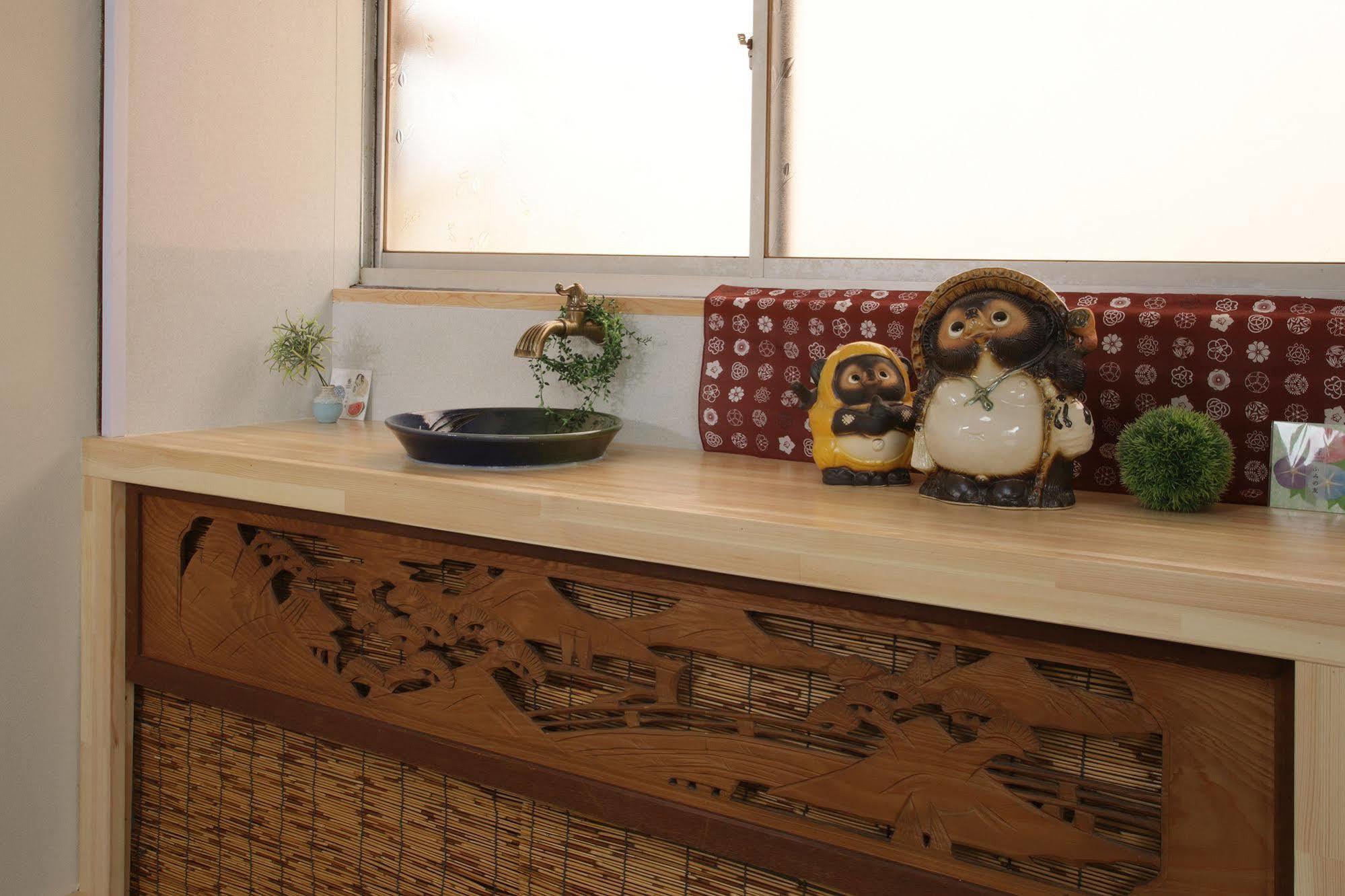 Guesthouse Oasis โอซาก้า ภายนอก รูปภาพ